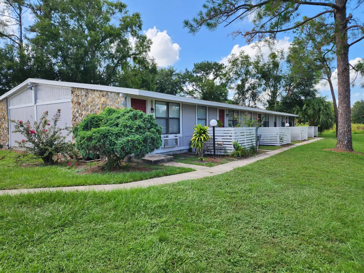 Landscaped apartment homes at Heatherwood in Kissimmee, Florida.