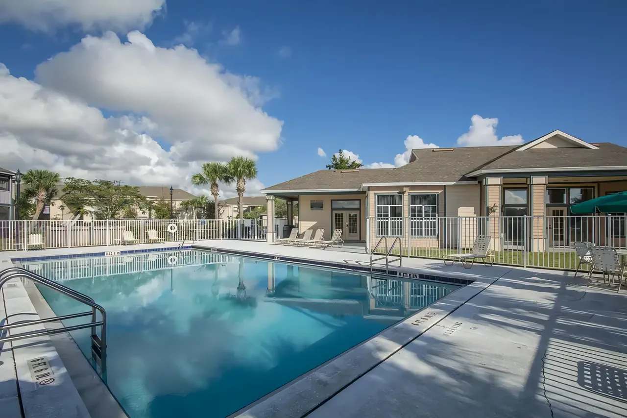 The swimming pool and clubhouse at Indian River in Vero Beach, Florida.