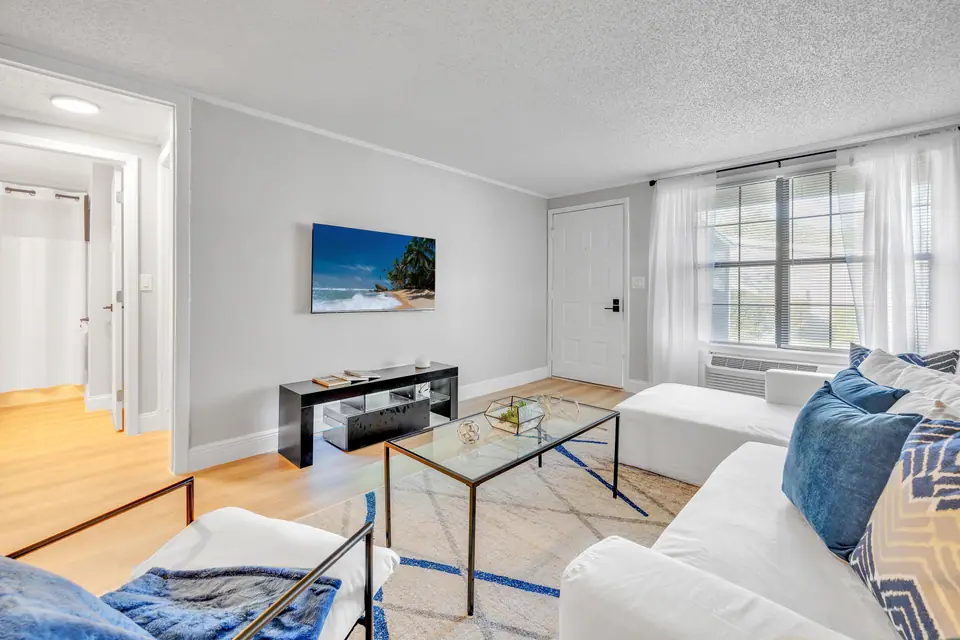 A furnished apartment living room at Jax Bay in Jacksonville, Florida.