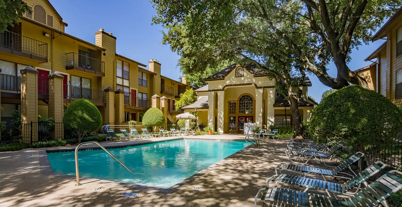 Landscaped apartment homes at Regal Court in Dallas, Texas.