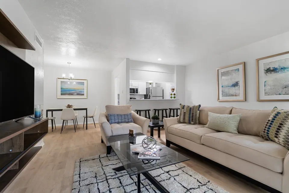 A renovated apartment living room at Regal Court in Dallas, Texas.