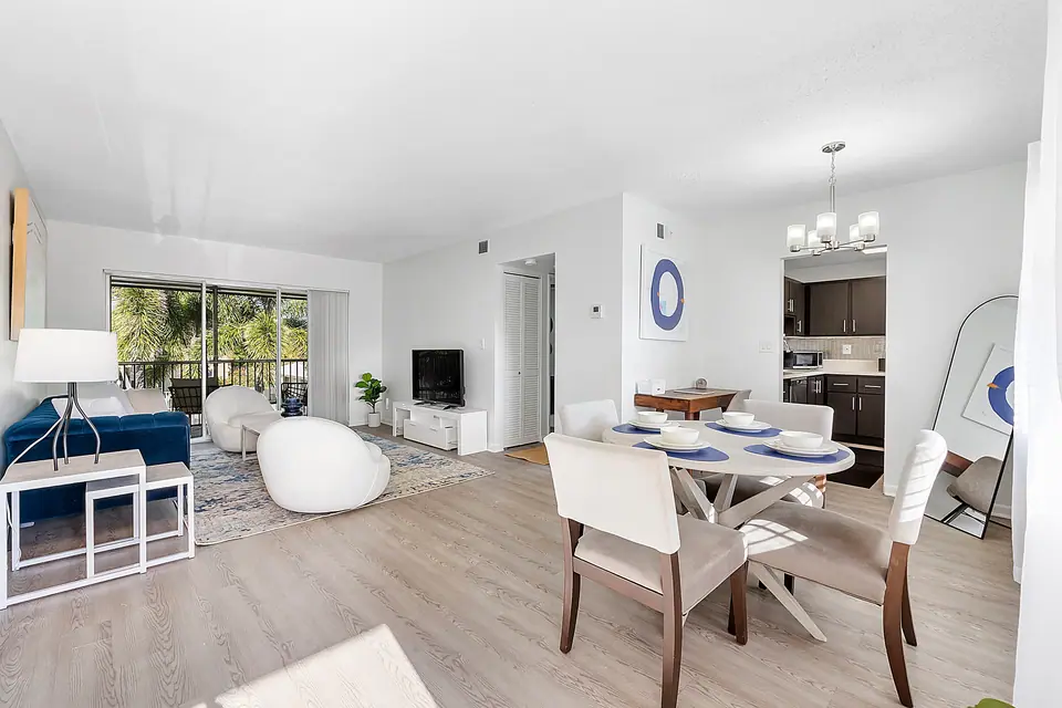 An open living and dining area at Waterford Bay in Boca Raton, Florida.